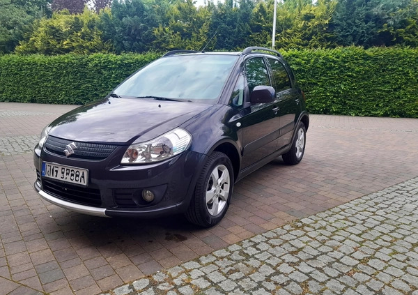 Suzuki SX4 cena 29900 przebieg: 150000, rok produkcji 2009 z Racibórz małe 121